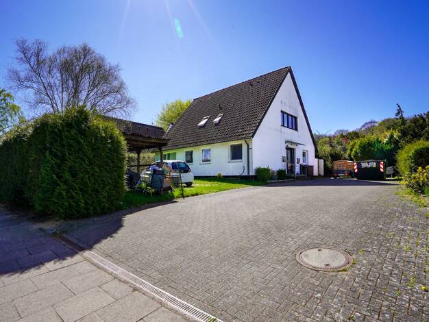 Mehrfamilienhaus zum Kauf 450.000 € 7 Zimmer 150 m² 1.066 m² Grundstück Klingberg Scharbeutz / Klingberg 23684