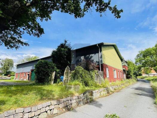 Mehrfamilienhaus zum Kauf 375.000 € 10 Zimmer 250 m² 2.650 m² Grundstück Wacken 25596