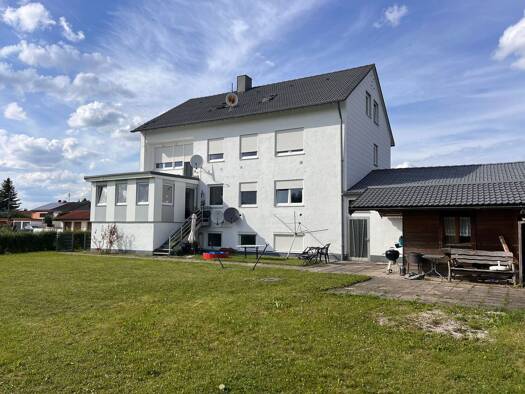 Mehrfamilienhaus zum Kauf als Kapitalanlage geeignet 1.470.000 € 16 Zimmer 365 m² 905 m² Grundstück Hallbergmoos 85399