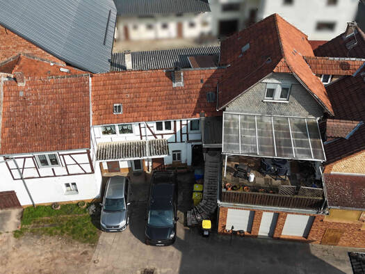 Mehrfamilienhaus zum Kauf 385.000 € 22 Zimmer 307 m² 755 m² Grundstück Niedermittlau Hasselroth 63594