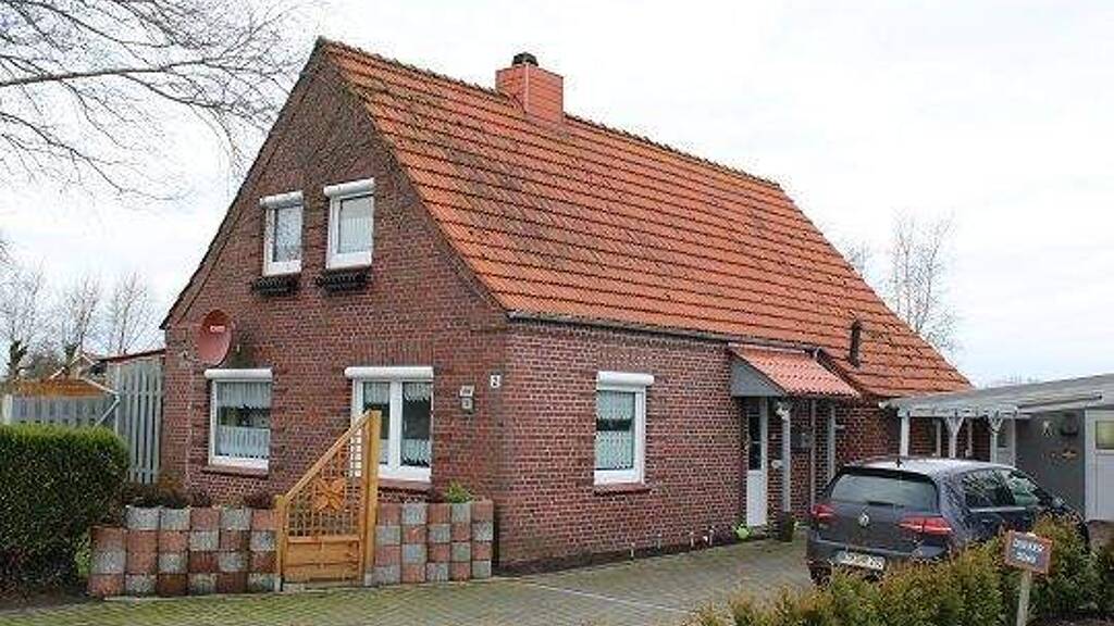 Einfamilienhaus zum Kauf 265.000 € 6 Zimmer 113 m² 1.250 m² Grundstück Esens 26427