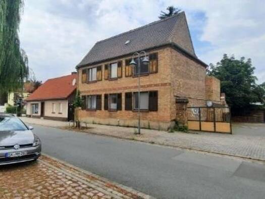 Mehrfamilienhaus zum Kauf 86.000 € 205 m² 425 m² Grundstück Platz der dt. Einheit 3 Sandersdorf Sandersdorf-Brehna 06792