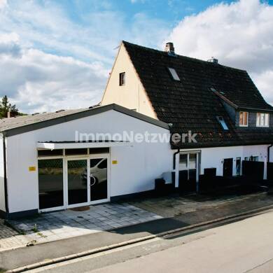 Haus zum Kauf 279.000 € 6 Zimmer 156 m² 615 m² Grundstück Arnstein Arnstein 97450