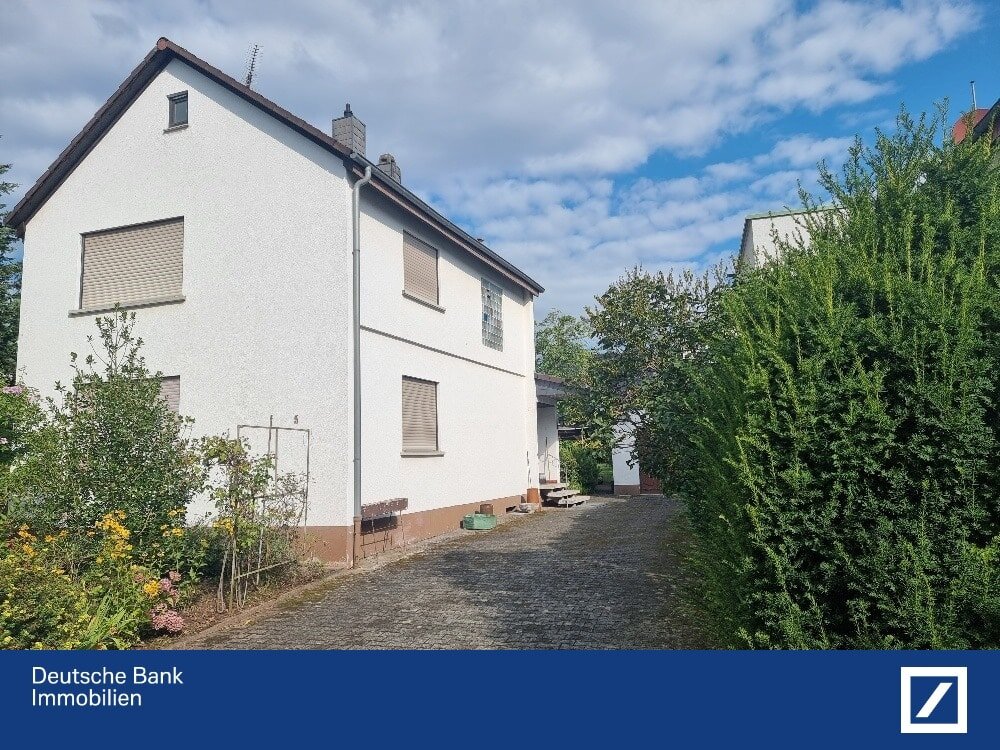 Einfamilienhaus zum Kauf 479.000 € 4 Zimmer 94 m²<br/>Wohnfläche 827 m²<br/>Grundstück Urberach mit Bulau Rödermark 63322