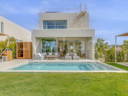 Haus zum Kauf 1.375.000 € 282 m² 570 m² Grundstück Santa Bárbara de Nexe 8005