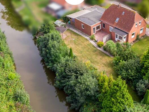 Einfamilienhaus zum Kauf 225.000 € 5 Zimmer 145 m² 936 m² Grundstück Pewsum Krummhörn 26736