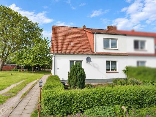 Doppelhaushälfte zum Kauf 189.000 € 4 Zimmer 97 m² 1.556 m² Grundstück Dorfstr. Benz 26 Benz Benz 23970