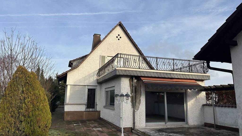 Einfamilienhaus zum Kauf 250.000 € 4 Zimmer 132 m² 500 m² Grundstück Neulussheim 68809