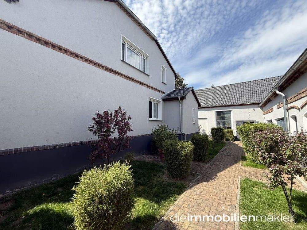 Immobilie in Heideblick - 2 Häuser: liebevoll saniertes Bauernhaus & Town u. Country Bungalow + Backsteinscheune - Bild 2