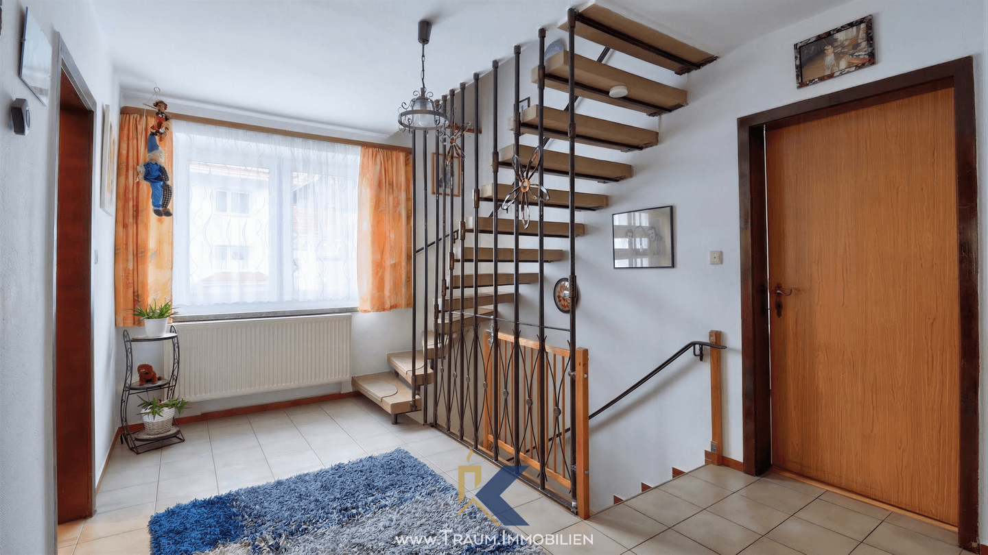 Immobilie in Südeichsfeld - Charmantes Einfamilienhaus mit viel Platz und vielseitigen Nutzungsmöglichkeiten in Heyerode - Bild 2