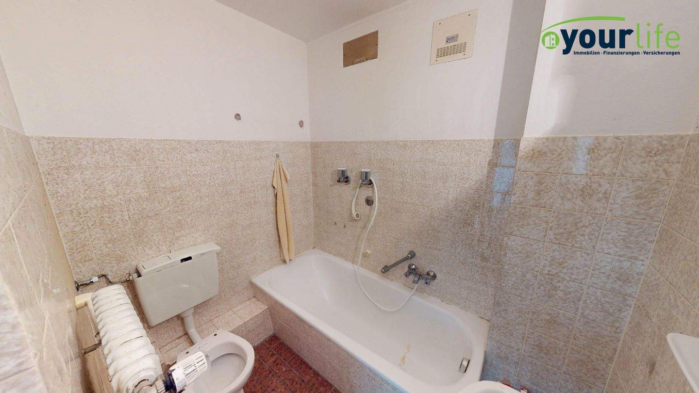 Immobilie in Memmingen - Zentrumsnahes Apartment mit Tiefgaragenstellplatz – renovierungsbedürftig - Bild 4