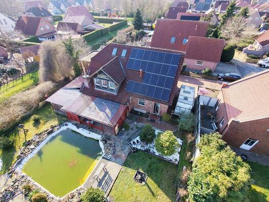 Einfamilienhaus zum Kauf 379.600 € 8 Zimmer 183 m² 974 m² Grundstück Völlenerkönigsfehn Westoverledingen 26810