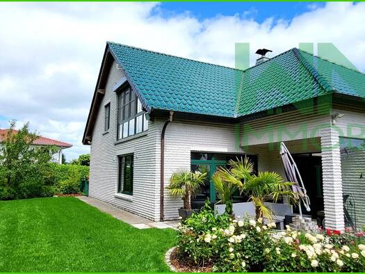 Einfamilienhaus zum Kauf 770.000 € 6 Zimmer 253 m² 1.400 m² Grundstück Dorum Wurster Nordseeküste 27639