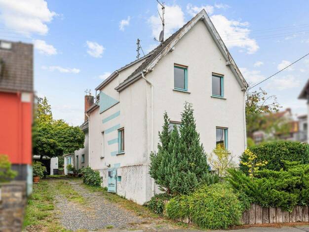 Einfamilienhaus zum Kauf 440.000 € 9 Zimmer 176 m² 390 m² Grundstück Wörsdorf Idstein 65510