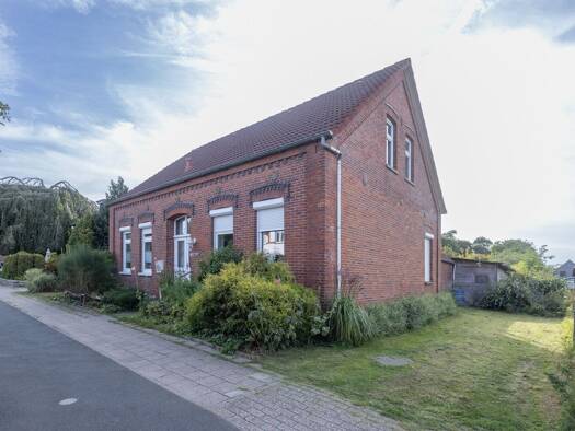 Einfamilienhaus zum Kauf 319.000 € 5 Zimmer 160,6 m² 1.103 m² Grundstück Carolinensiel Wittmund 26409