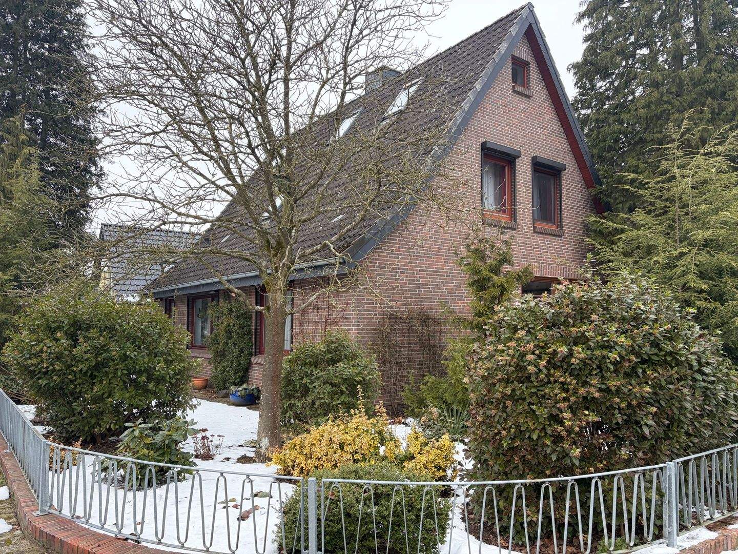 Immobilie in Oerel - Wohnhaus mit Garage und  überdachter Terrasse in Sonnenmulde - Bild 0