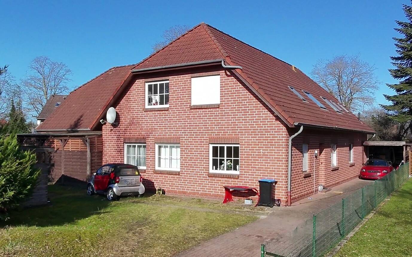 Immobilie in Uplengen - Attraktives Mehrfamilienhaus mit drei Wohneinheiten in zentraler Lage von Remels! - Bild 1