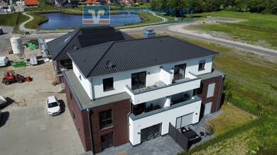 Mehrfamilienhaus zum Kauf - Neubau 445 m² 704 m² Grundstück Hengstforde Apen-Augustfehn 26689