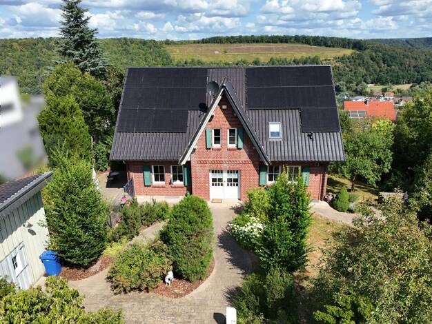 Einfamilienhaus zum Kauf 729.000 € 7 Zimmer 250 m² 1.000 m² Grundstück Hofgarten Wertheim 97877