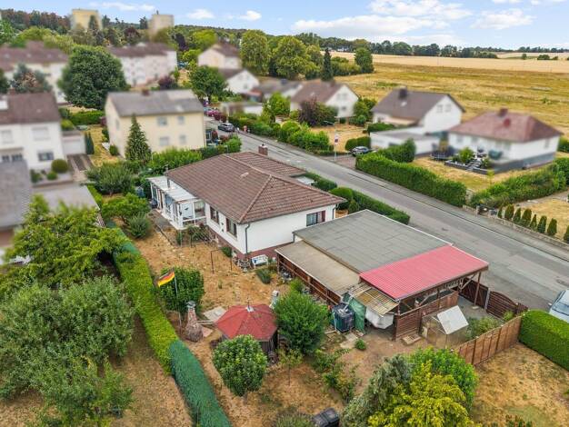 Einfamilienhaus zum Kauf 469.000 € 4 Zimmer 124 m² 933 m² Grundstück Butzbach Butzbach 35510