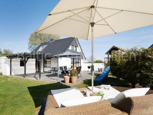 Haus zum Kauf 384.900 € 3 Zimmer 69 m² 700 m² Grundstück Sütel Neukirchen 23779