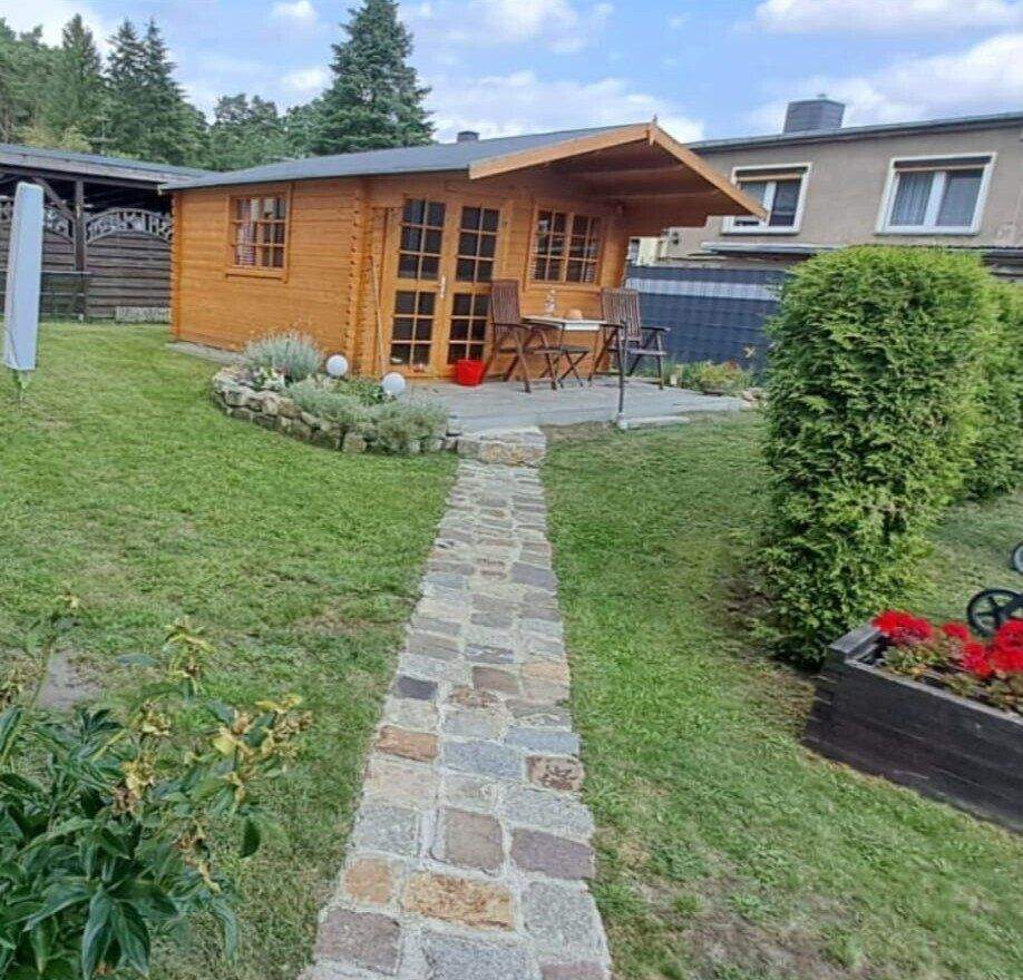 Immobilie in Burgstall - Einfamilienhaus mit ausgebautem Keller, Kamin und Pool in ruhiger Lage. - Bild 4