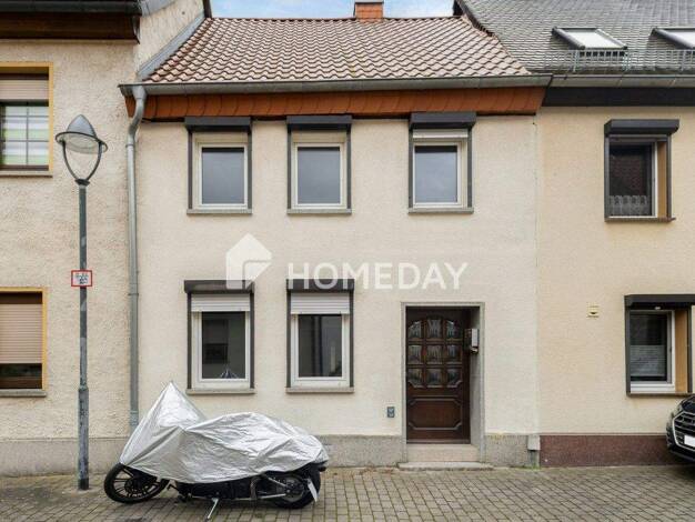 Reihenmittelhaus zum Kauf 64.000 € 3 Zimmer 89 m² 690 m² Grundstück Zörbig 06780
