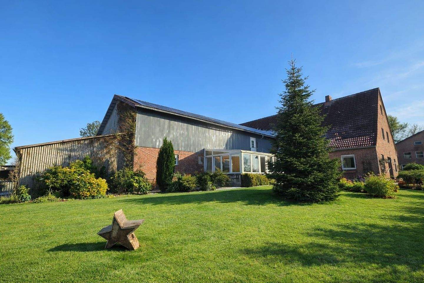 Immobilie in Neuenkirchen - Ländliche Idylle mit Wasserzugang: Charmanter Resthof mit Ferienwohnung und weitläufigem Grundstück - Bild 0