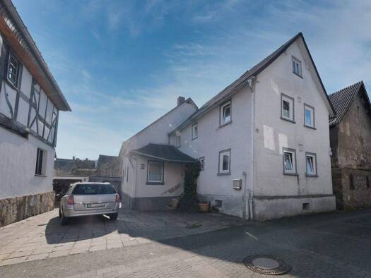 Mehrfamilienhaus zum Kauf provisionsfrei 219.000 € 8 Zimmer 186,4 m² 368 m² Grundstück Aßlar 35614