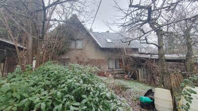 Einfamilienhaus zum Kauf 100.000 € 5 Zimmer 110 m² 1.680 m² Grundstück Alte Gasse 15 Leukersdorf Leukersdorf 09387