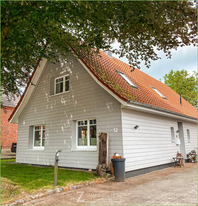Einfamilienhaus zum Kauf 330.000 € 4 Zimmer 135,5 m² 876 m² Grundstück Stapel 25879