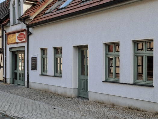 Laden zur Miete provisionsfrei 336 € 2 Zimmer 48 m² Verkaufsfläche Schloßstraße 61 Oranienbaum Oranienbaum-Wörlitz 06785