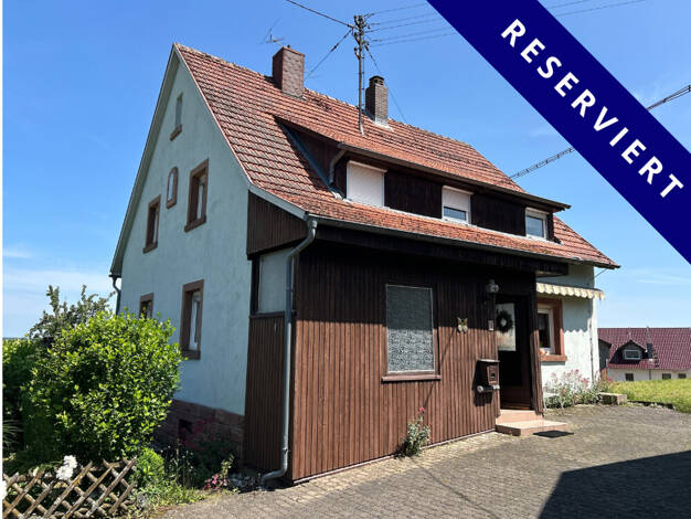 Einfamilienhaus zum Kauf 198.000 € 6 Zimmer 143 m² 1.434 m² Grundstück Windischbuchen Eichenbühl / Windischbuchen 63928