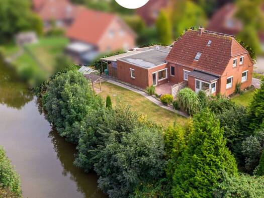 Einfamilienhaus zum Kauf 249.000 € 5 Zimmer 145 m² 936 m² Grundstück Pewsum Krummhörn 26736