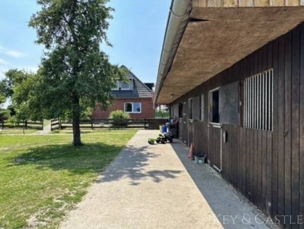 Haus zum Kauf 600.000 € 12 Zimmer 320 m² 5.600 m² Grundstück Dörrieloh Varrel 27259