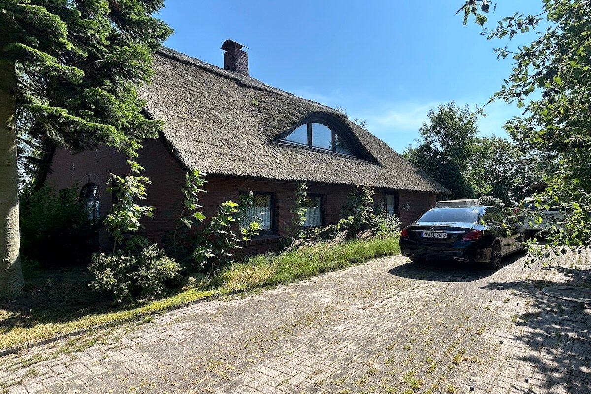 Einfamilienhaus zum Kauf 288.000 € 5 Zimmer 124 m²<br/>Wohnfläche 2.057 m²<br/>Grundstück Abbehausen Nordenham 26954