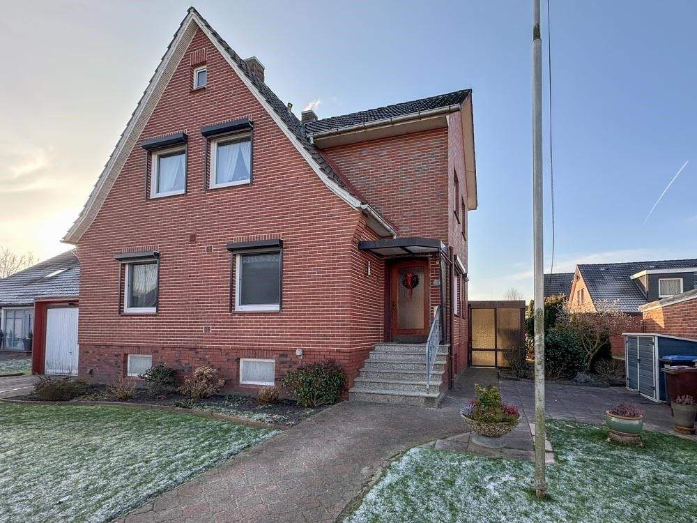 Immobilie in Drochtersen - Solides Einfamilienhaus mit Garage in Drochtersen - Bild 1