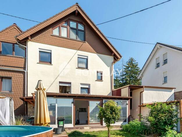 Mehrfamilienhaus zum Kauf 628.000 € 9 Zimmer 200 m² 570 m² Grundstück Delkenheim Wiesbaden 65205