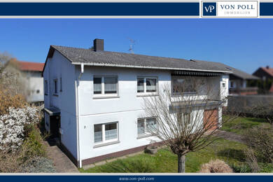 Einfamilienhaus zum Kauf 345.000 € 8 Zimmer 174 m² 1.015 m² Grundstück Fronhausen Fronhausen 35112