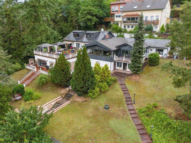 Einfamilienhaus zum Kauf 1.150.000 € 8 Zimmer 505 m² 1.652 m² Grundstück Langenhain-Ziegenberg Ober-Mörlen 61239