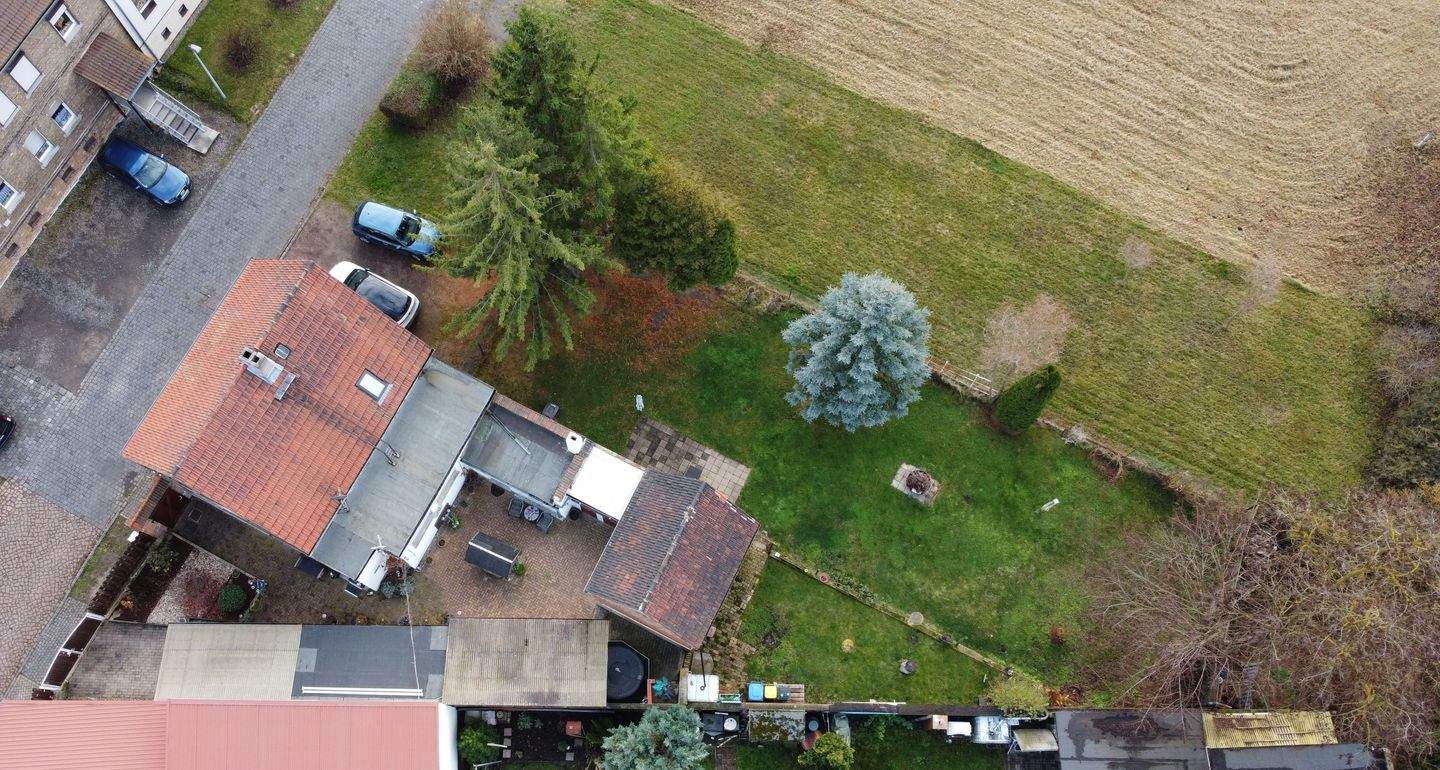 Immobilie in Seegebiet Mansfelder Land - Charmantes Einfamilienhaus mit Carport, Garage & Nebengelass - Bild 3