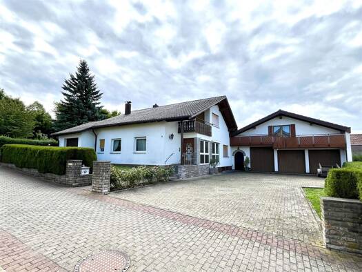 Einfamilienhaus zum Kauf 493.000 € 5 Zimmer 138 m² 1.365 m² Grundstück Igersheim Igersheim 97999