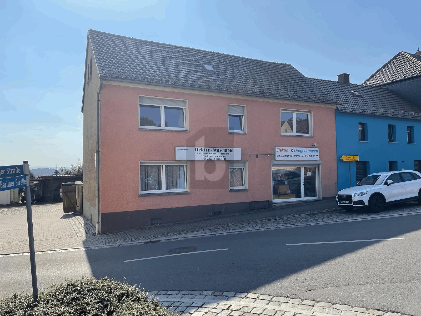 Wohn- und Geschäftshaus zum Kauf als Kapitalanlage geeignet 99.000 € 6 Zimmer 124 m²<br/>Fläche 180 m²<br/>Grundstück Hohenleipisch Hohenleipisch 04934