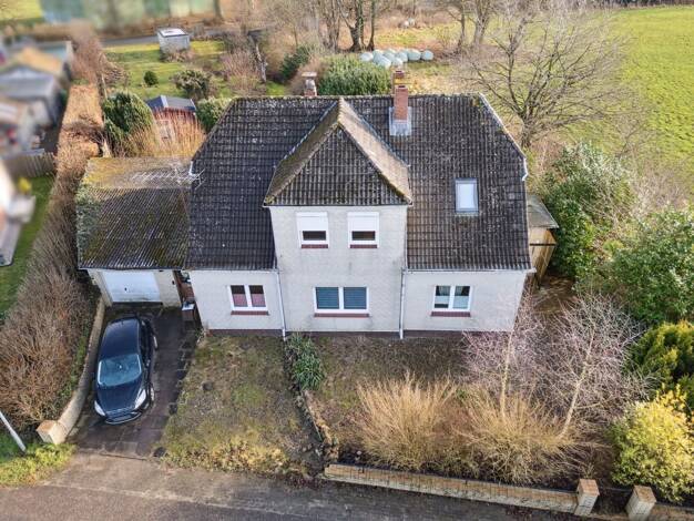 Einfamilienhaus zum Kauf 275.000 € 6 Zimmer 165 m² 1.579 m² Grundstück Tarbek 24619