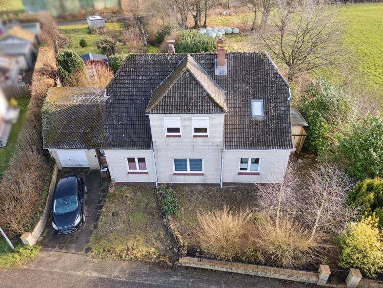 Einfamilienhaus zum Kauf 275.000 € 6 Zimmer 165 m² 1.579 m² Grundstück Tarbek 24619