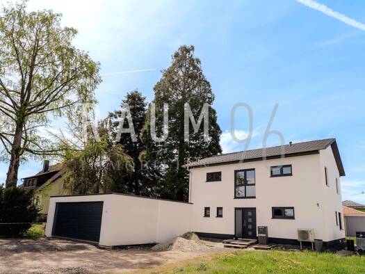 Einfamilienhaus zum Kauf 629.000 € 5 Zimmer 123,6 m² 602 m² Grundstück Unterzettlitz Bad Staffelstein 96231