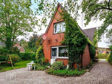 Einfamilienhaus zum Kauf 164.500 € 9 Zimmer 145 m² 1.895 m² Grundstück Veenhusen Moormerland 26802