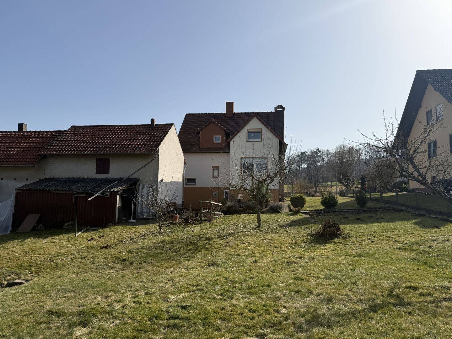 Immobilie in Wehretal - Charmantes Einfamilienhaus mit großem Grundstück, Nebengebäude & traumhaftem Blick ins Grüne - Bild 4