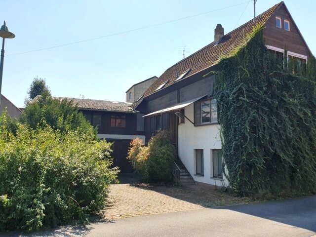 Haus zum Kauf 195.000 € 7 Zimmer 195 m²<br/>Wohnfläche 1.585 m²<br/>Grundstück Wenkheim Werbach 97956