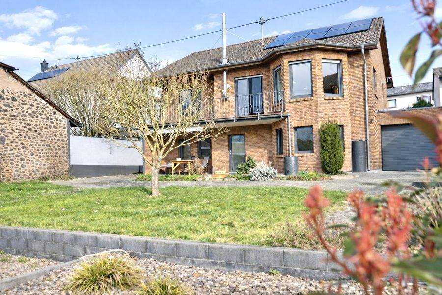 Immobilie in Saffig - Lichtdurchflutetes Einfamilienhaus mit offenem Wohnbereich und großem Garten - Bild 0